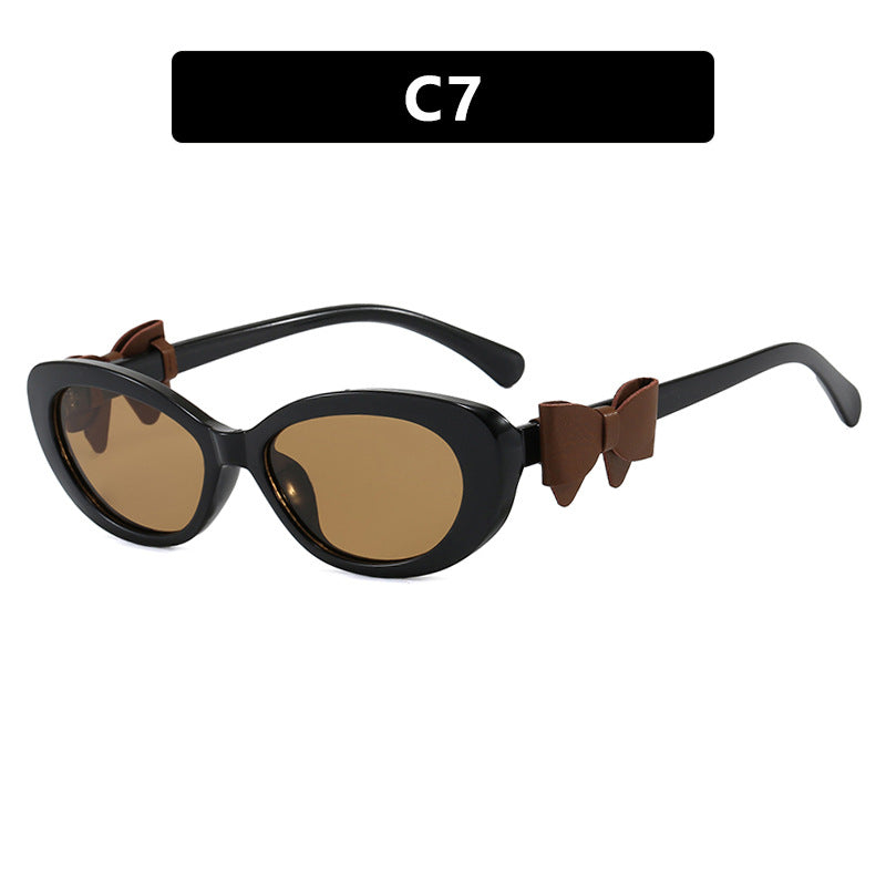 Damen modische Sonnenbrille mit verspieltem Schleifen-Design Karnz