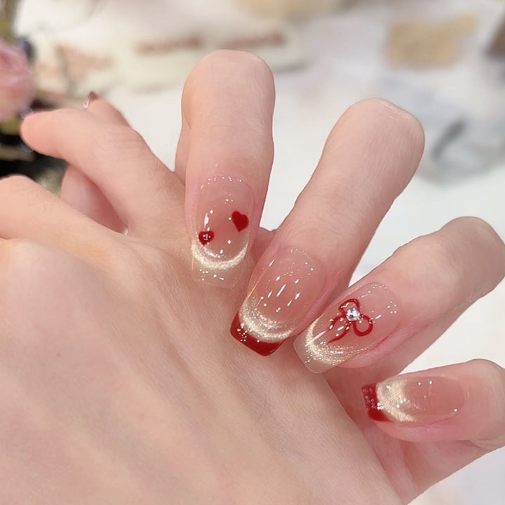 Künstlerische Herz-Themen Press-On Nagelkunst Karnz