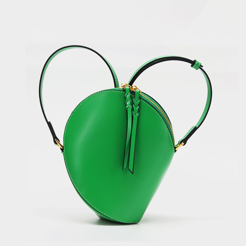 Skulpturales Tropfen-Crossbody-Bag mit verstellbarem Riemen & Quastenreißverschluss