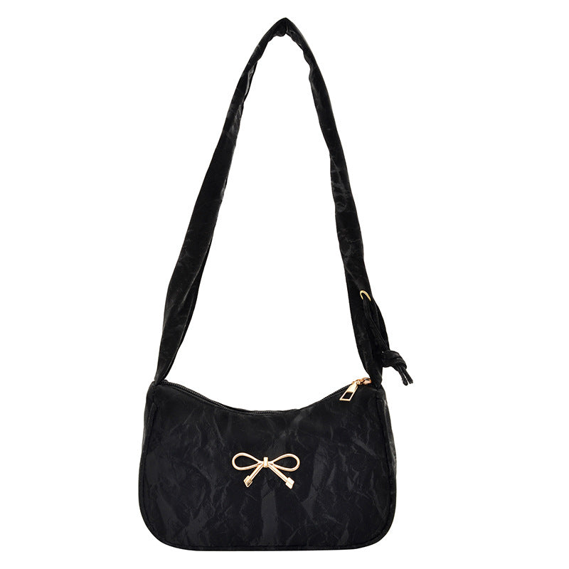 Elegante Schultertasche mit Schleifenverzierung