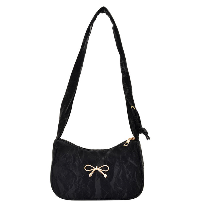 Elegante Schultertasche mit Schleifenverzierung