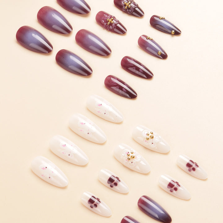 Blumenverzierte Stiletto-Nagelkunst Karnz