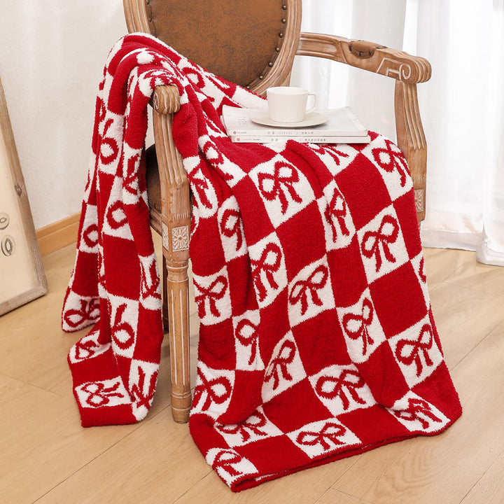 Gemütliche dekorative Strickdecke