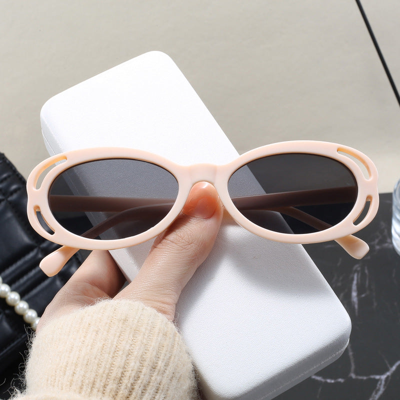 Damen modische Sonnenbrille mit ovalem Rahmen und einzigartigem Design Karnz