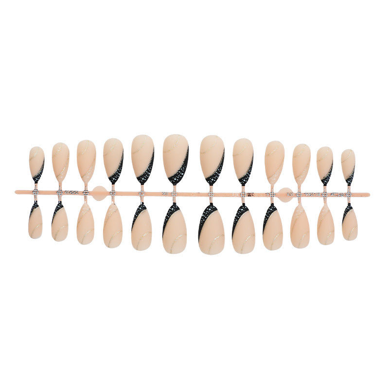 Stylisches Stiletto Press-on Nagelkunstset mit goldenen Akzenten Karnz