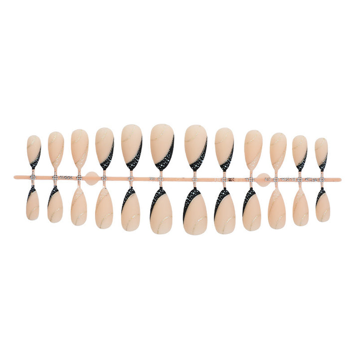 Stylisches Stiletto Press-on Nagelkunstset mit goldenen Akzenten Karnz