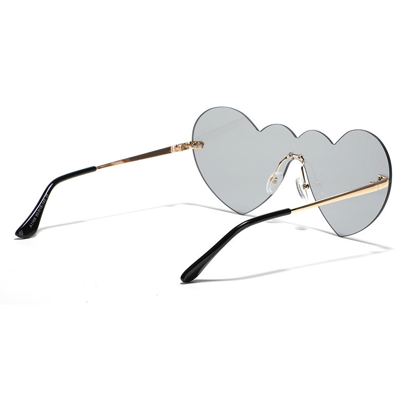 Damen extravagante Herz-Sonnenbrille mit schützenden Gläsern Karnz