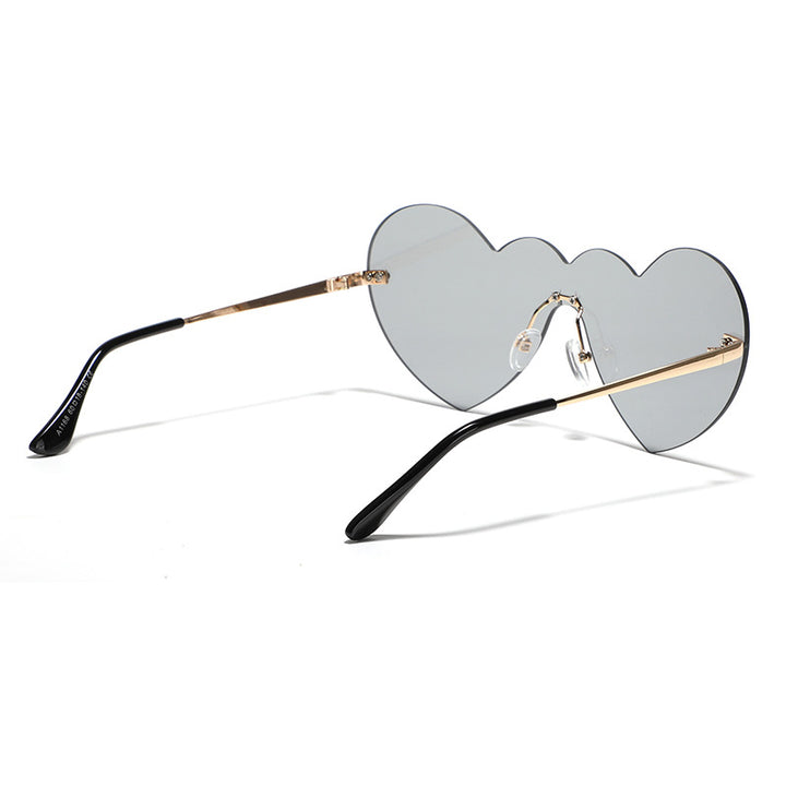 Damen extravagante Herz-Sonnenbrille mit schützenden Gläsern Karnz