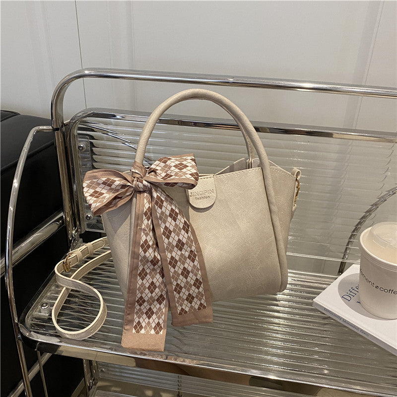 Elegante Schleifenakzent-Handtasche Karnz