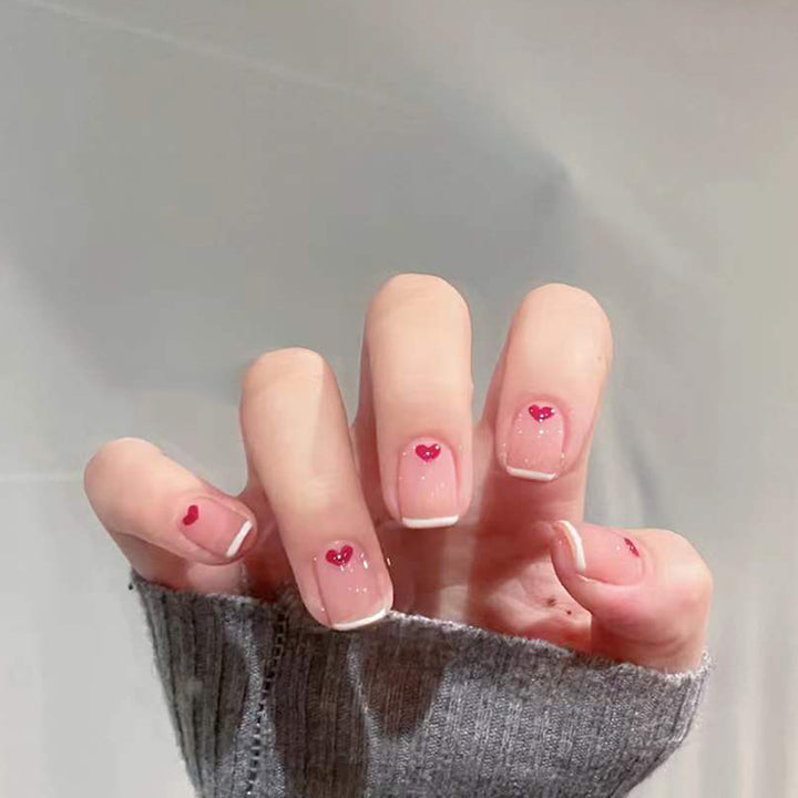 Herz-Prägung Press-On Nagelset Karnz
