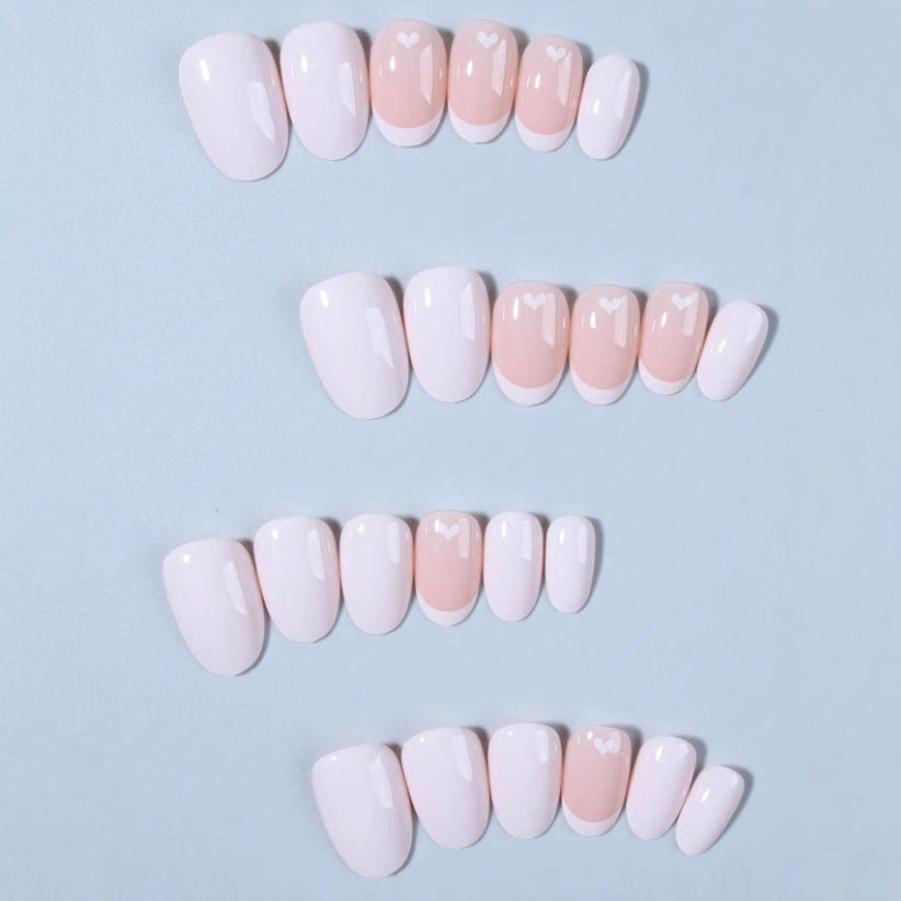 Kunstnagelset mit kreativem Herzmotiv Karnz