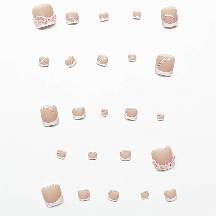 Fußnagelkunstset mit elegantem French Design und Glamourösen Strassakzenten Karnz