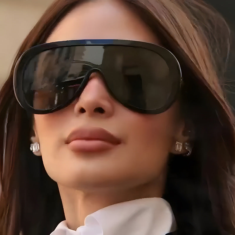 Damen futuristische Sportsonnenbrille mit breiter Sichtscheibe und UV-Schutz Karnz