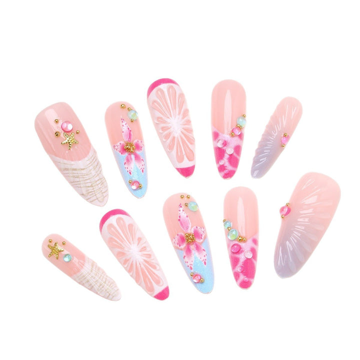 Kunstnagelset mit floralem und fröhlichem Design Karnz
