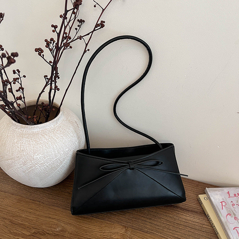 Elegante Handtasche mit Schleifendetail