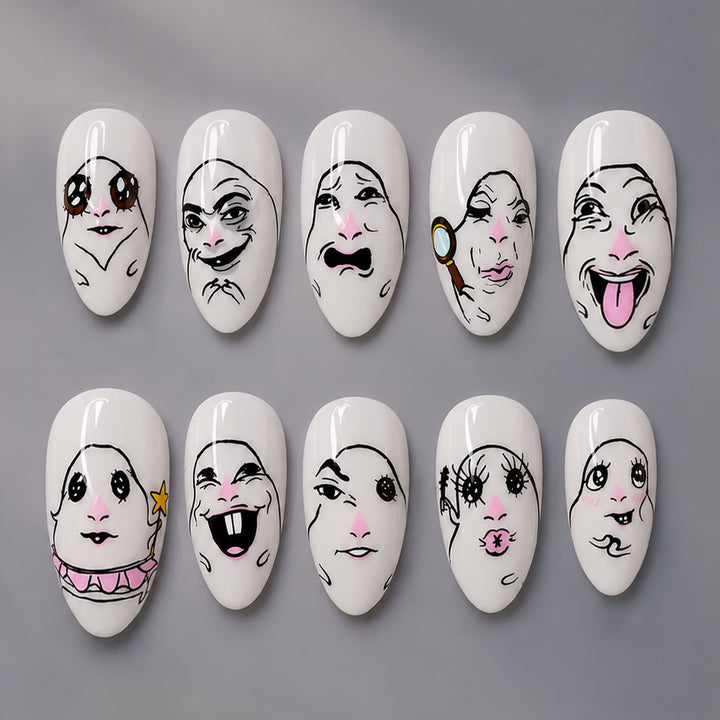 Kreatives Kunstnagelset mit Gesichtsmotiven Karnz