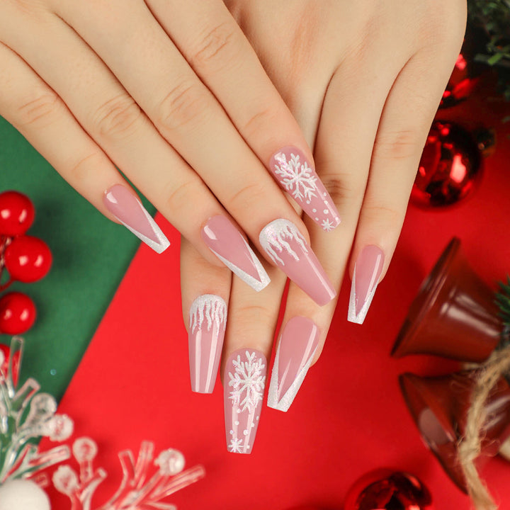 Kunstvolle Stiletto-Nägel mit Schneeflocken-Motiv Karnz