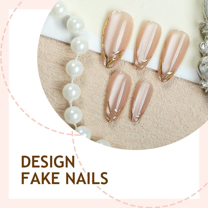 Künstliche Nagelspitzen mit elegantem Goldakzent Karnz