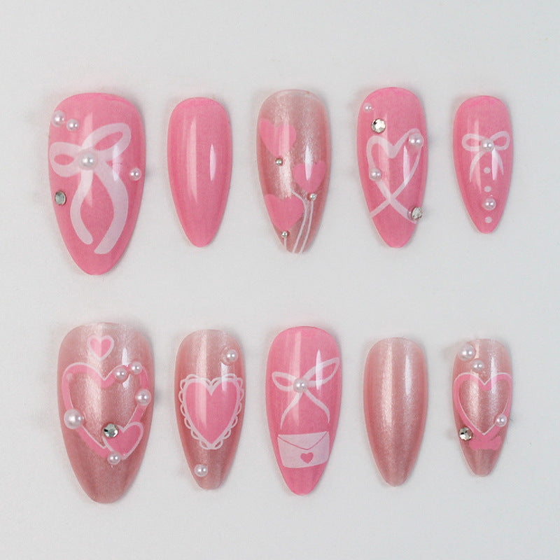 Premium Kunstnagelset mit romantischen Herz- und Schleifenmotiven Karnz