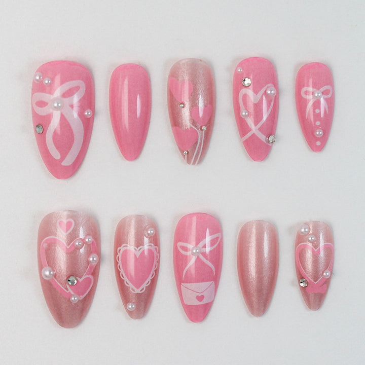Premium Kunstnagelset mit romantischen Herz- und Schleifenmotiven Karnz