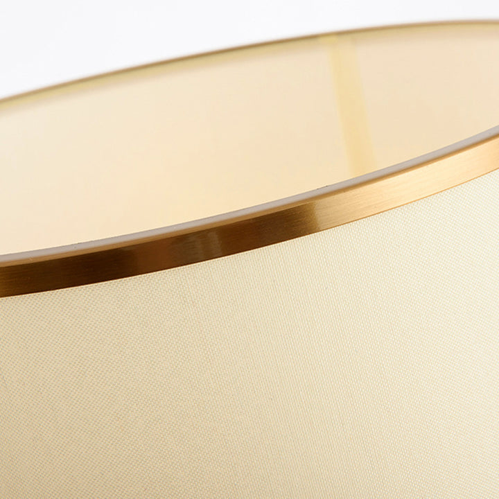 Elegante moderne Tischlampe mit skulpturaler goldener Basis