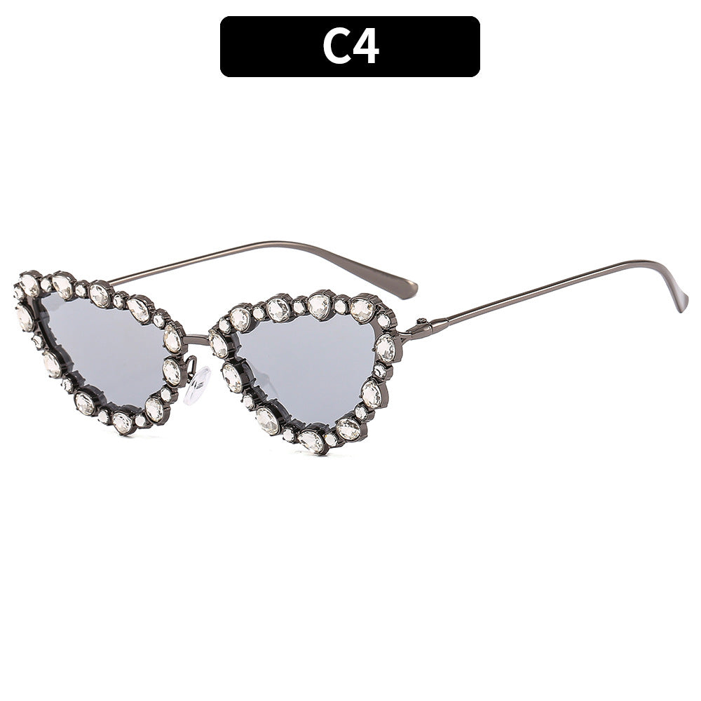 Herzförmige, mit Strass veredelte Sonnenbrille