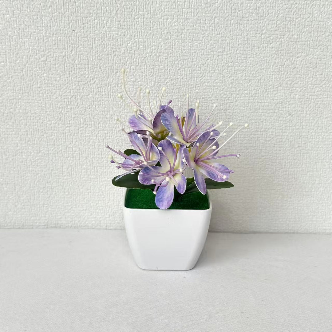 Lebensechte florale Tischmitte für die innere Wohnkultur