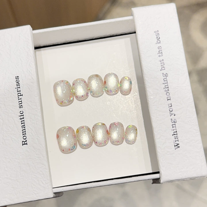 Kunstnagelset mit Romantischem Glitzereffekt Karnz