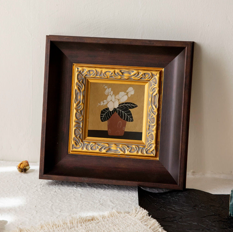 Wandkunst mit ornamentalem Rahmen