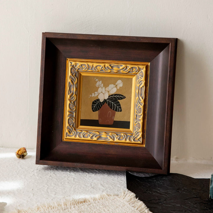 Wandkunst mit ornamentalem Rahmen