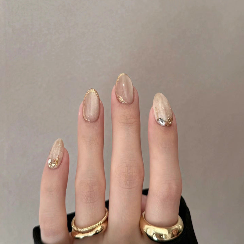 Elegante glänzende Press-On-Nagelset mit goldenen Akzenten Karnz