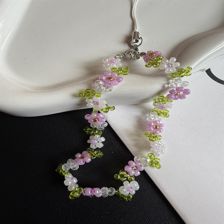 Blumiger Perlenbrillenhalter Karnz