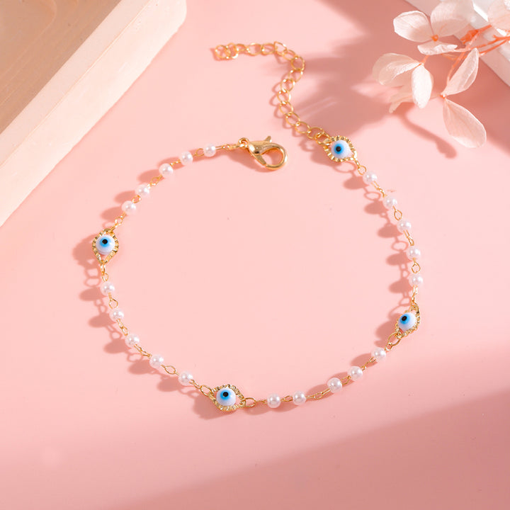 Elegante Perlen- und Augen-Anhänger-Halskette Karnz