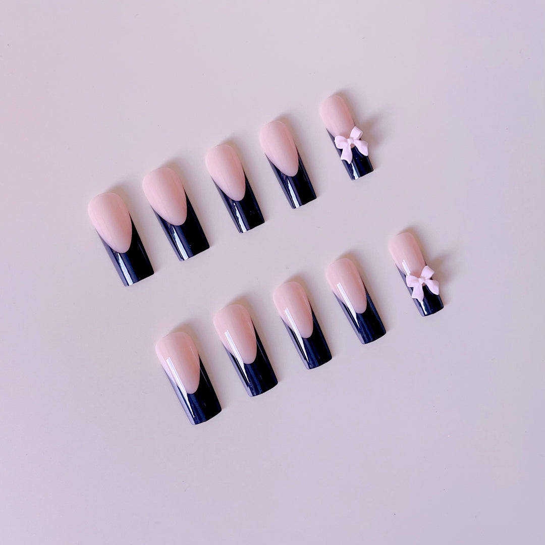 Kunstvolle Nagelverlängerungen mit Schleifen-Design Karnz