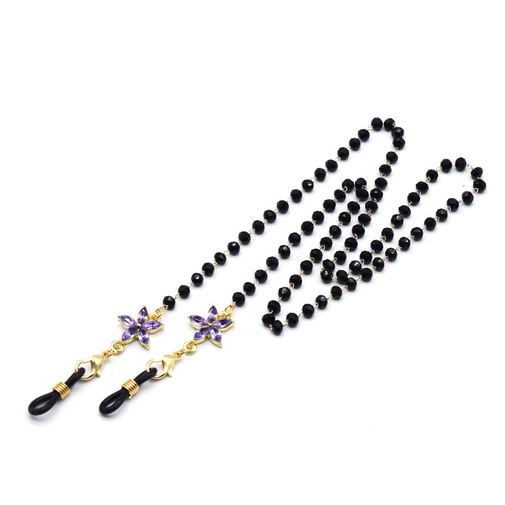 Eleganter mit Blumenakzenten verzierter Brillenketten Karnz