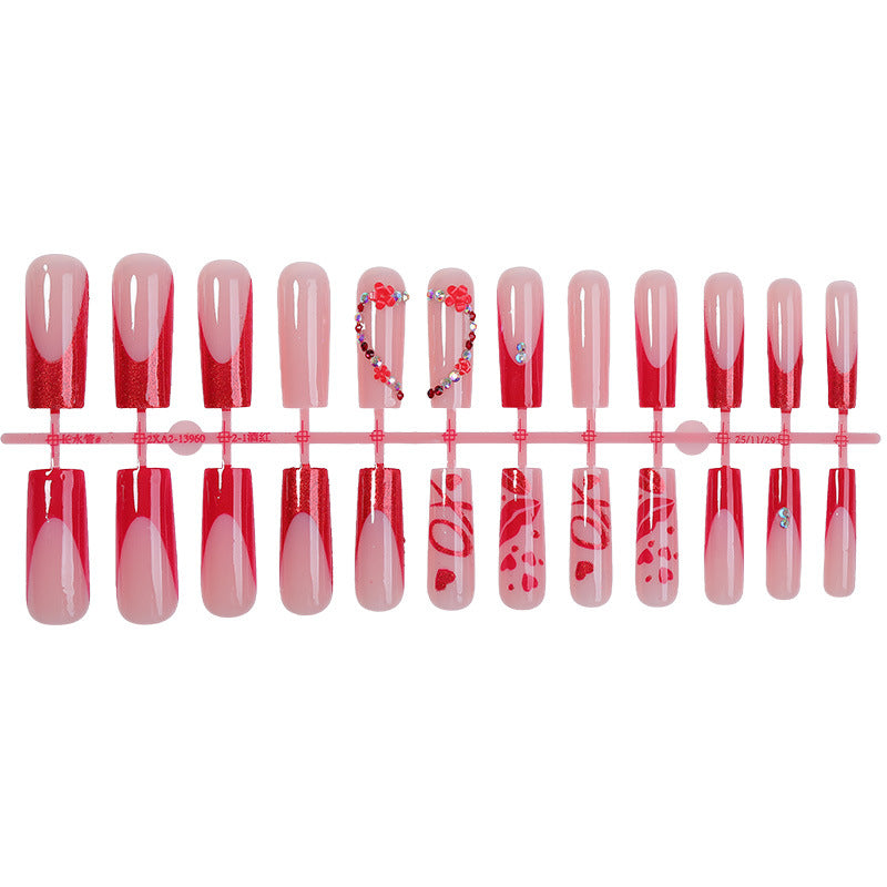 Elegantes Press-On Nagelkunstset mit floralen und Glitzerakzenten Karnz