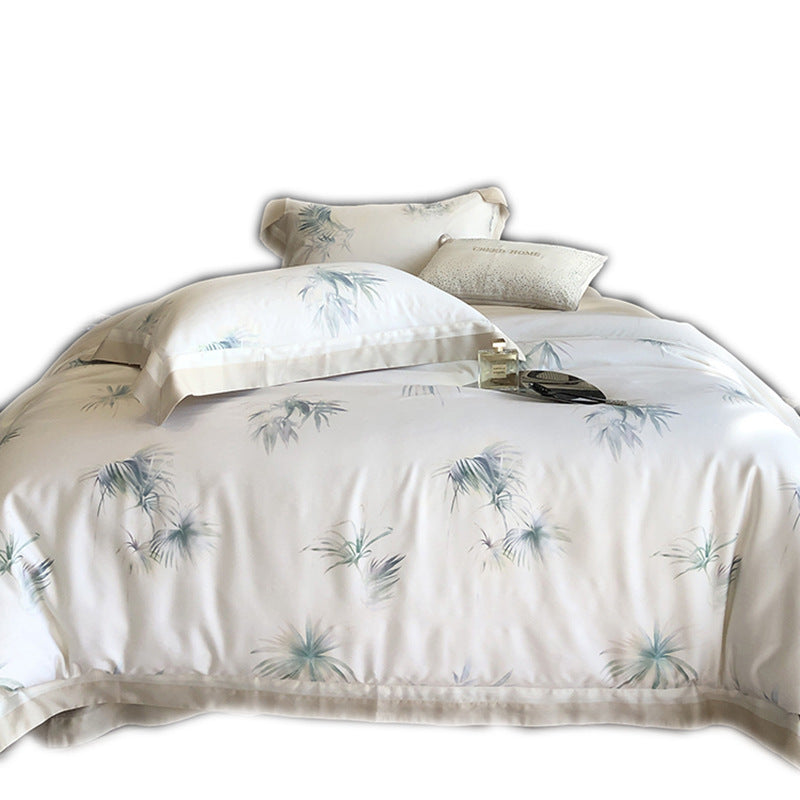 Luxuriöses Baumwollsatin-Bettwäsche-Set mit zartem Blattprint, kontrastiertem Saum und feiner Paspel