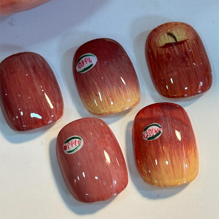 Künstlerisches Press-on-Nail-Set mit einzigartigen Apfel-Designs Karnz