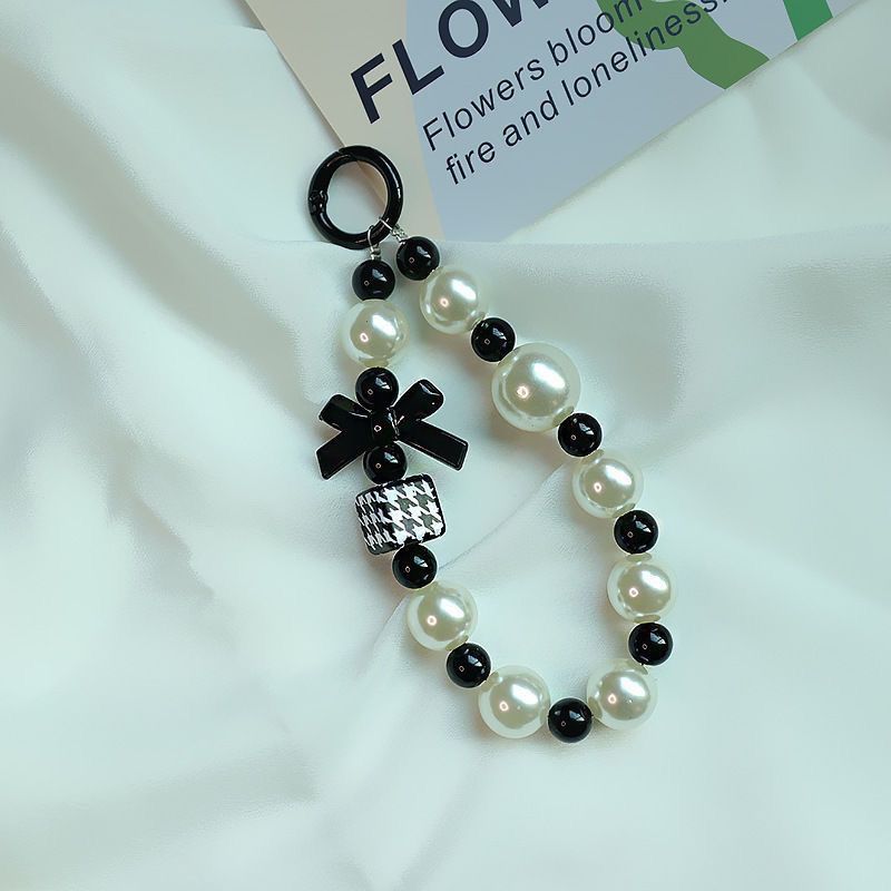 Elegante Perlen- und schwarze Perlen-Charm-Armband Karnz