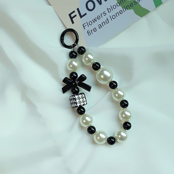 Elegante Perlen- und schwarze Perlen-Charm-Armband Karnz