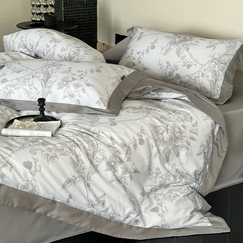 Exklusive Baumwollsatin-Bettwäschegarnitur mit floraler Jacquardstruktur und Wendefunktion