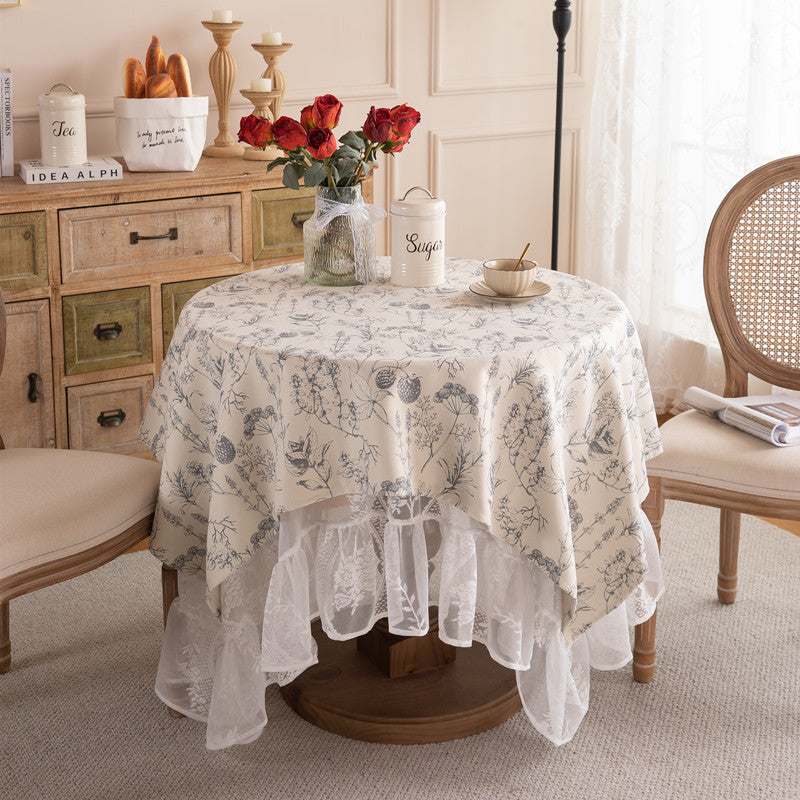 Elegante florale Spitzenoverlay-Tischdecke