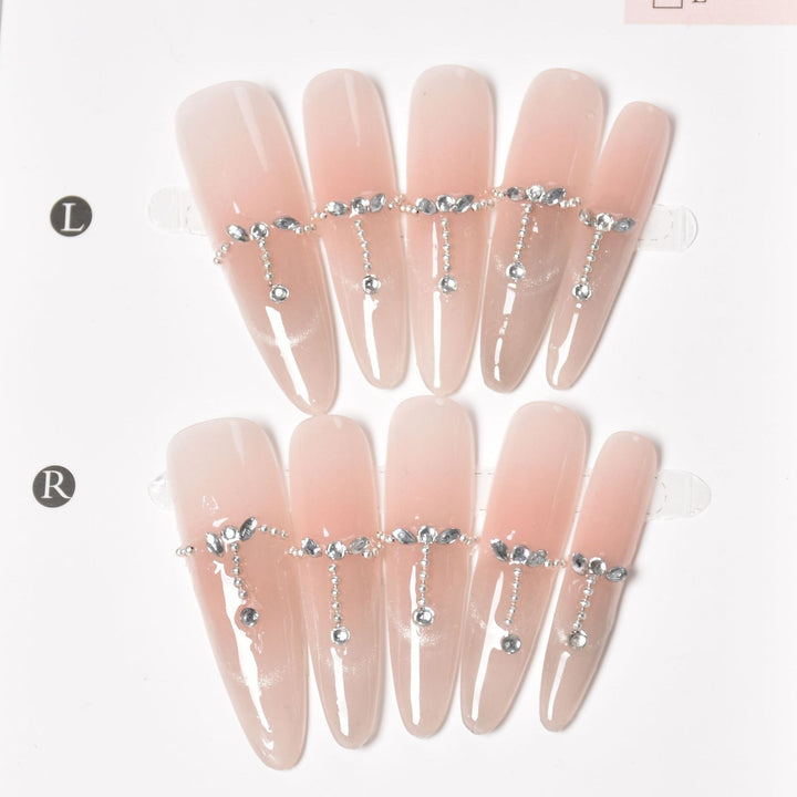 Elegante mit Strass akzentuierte Press-On Nägel Karnz
