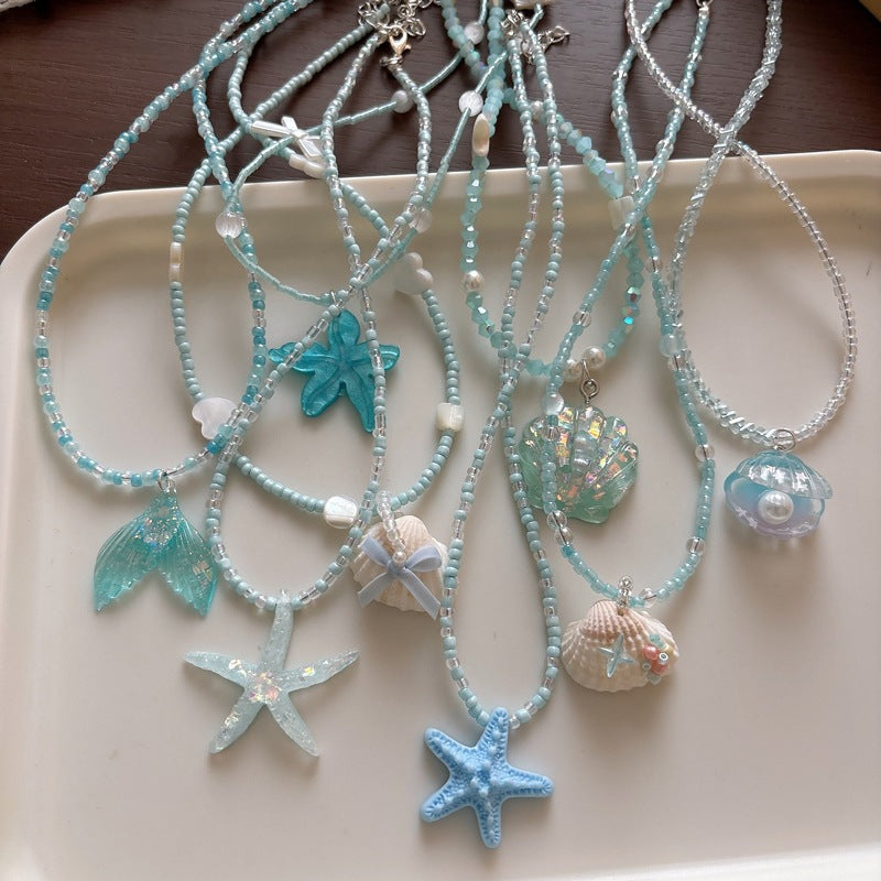 Halskette mit Glitzerfischschwanz Karnz