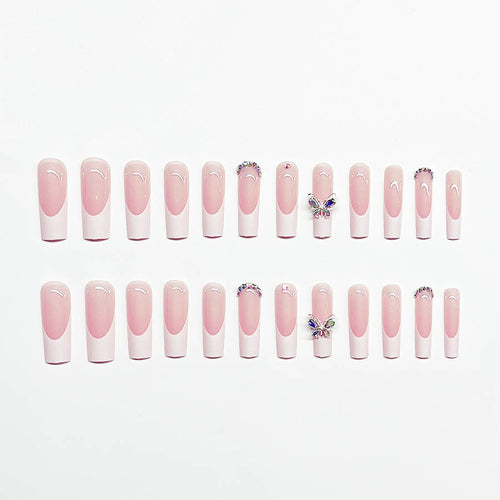 Kunstnagelset mit elegantem Design und funkelnden Strassakzenten Karnz