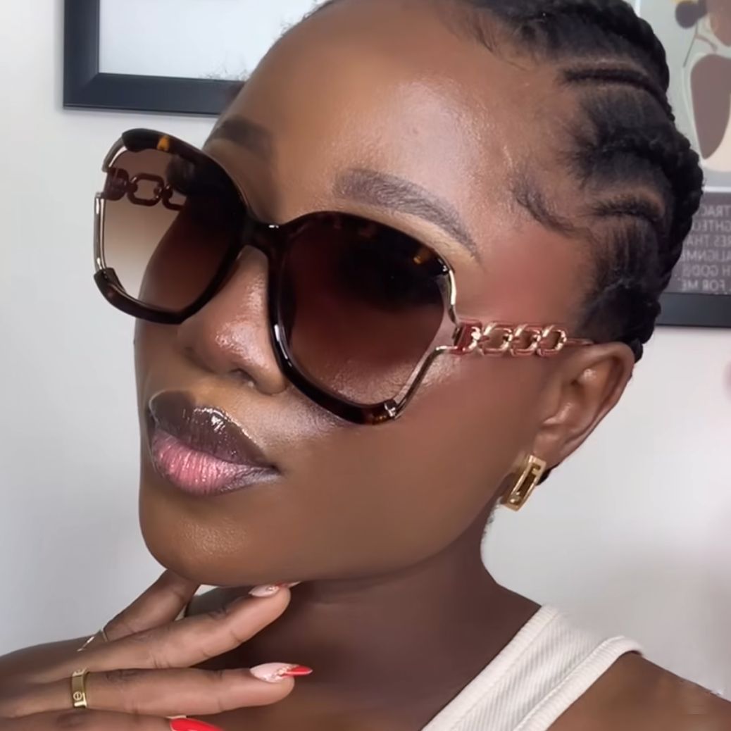 Damen modische Sonnenbrille mit goldenen Kettendetails Karnz