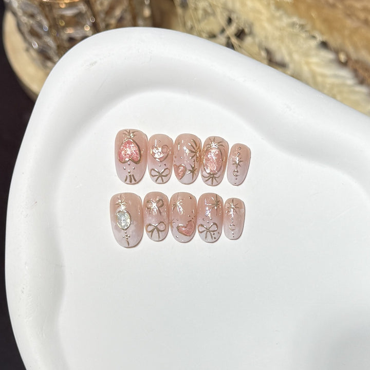 Dekorativer Press-On Nail Art Set mit Herz- und Glitzerakzenten Karnz