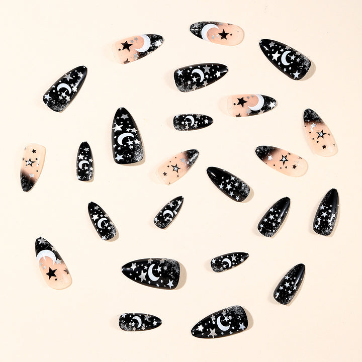 Stiletto Nagelkunstverlängerungen mit himmlischem Design Karnz