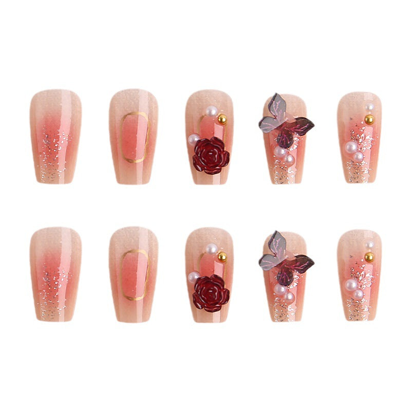 Kunstnagelset mit eleganten 3D-Blüten- und Schmetterlingsverzierungen Karnz