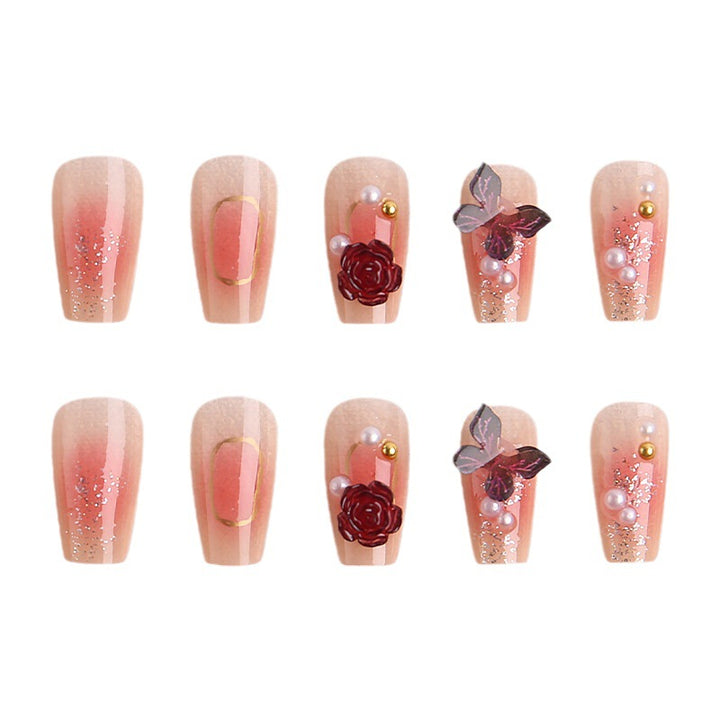 Kunstnagelset mit eleganten 3D-Blüten- und Schmetterlingsverzierungen Karnz